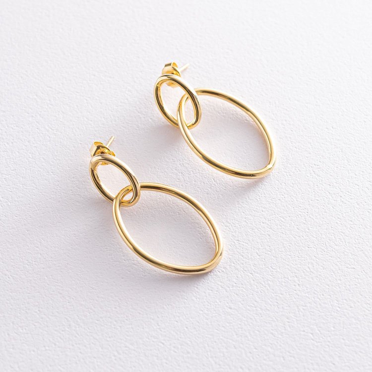 Срібні сережки "Неповторність" з позолотою 122641 від ювелірного магазину Онікс