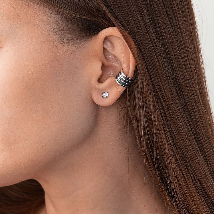 Серебряная серьга - каффа "Линии" 123107 от ювелирного магазина Оникс