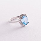 Серебряное кольцо с голубым топазом и фианитами 111432 от ювелирного магазина Оникс