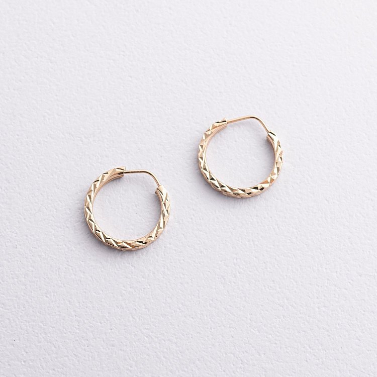 Сережки - кільця в жовтому золоті (1.2 см) с07307 від ювелірного магазину Онікс