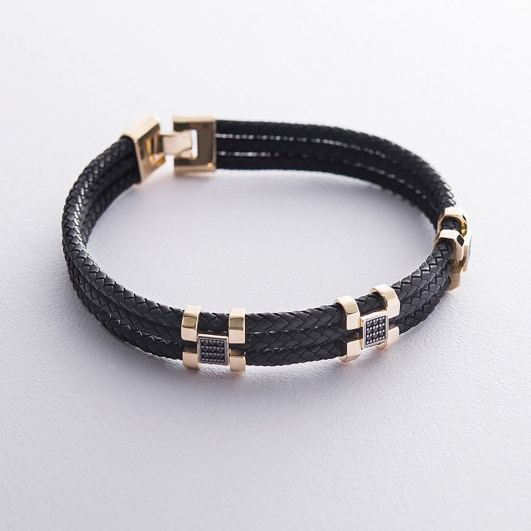 Чоловічий браслет з золотими вставками і фіанітами б02357 від ювелірного магазину Онікс