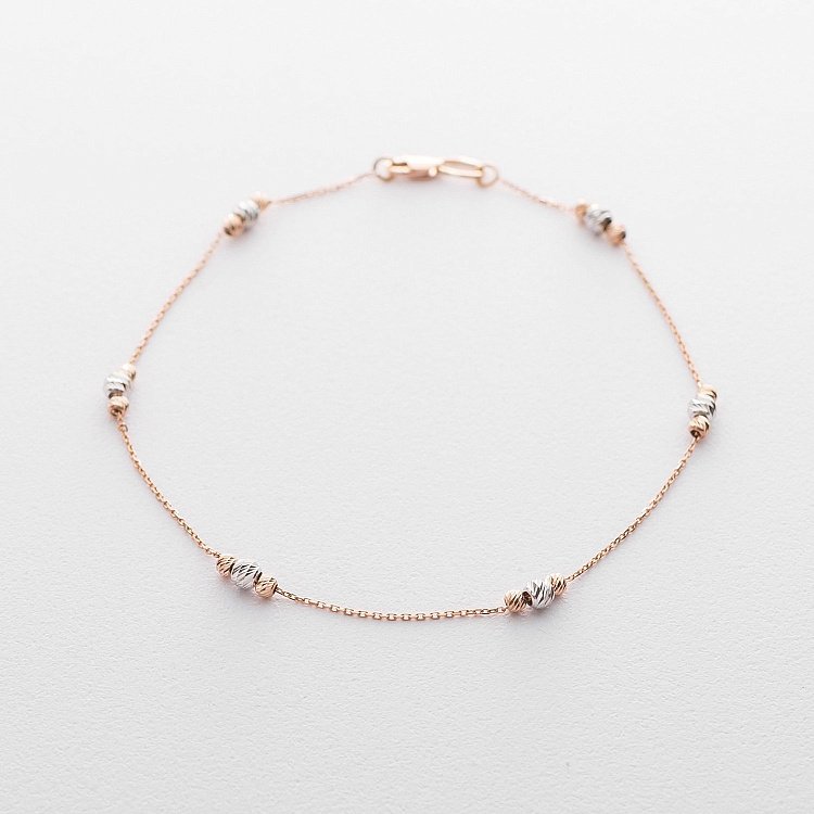 Золотий браслет на ногу з кульками б03690 від ювелірного магазину Онікс