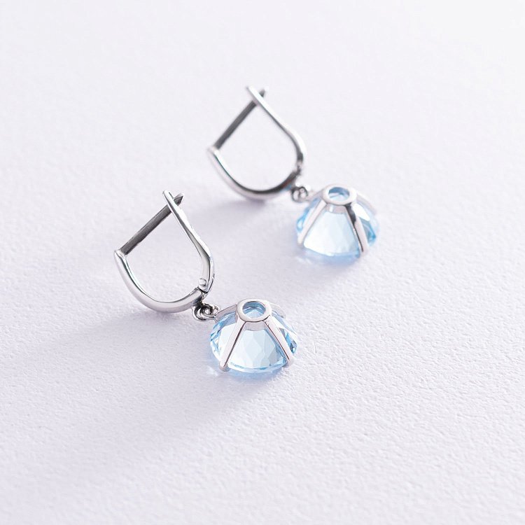 Золоті сережки "Захоплення" з блакитним топазом с05290 від ювелірного магазину Онікс - 8