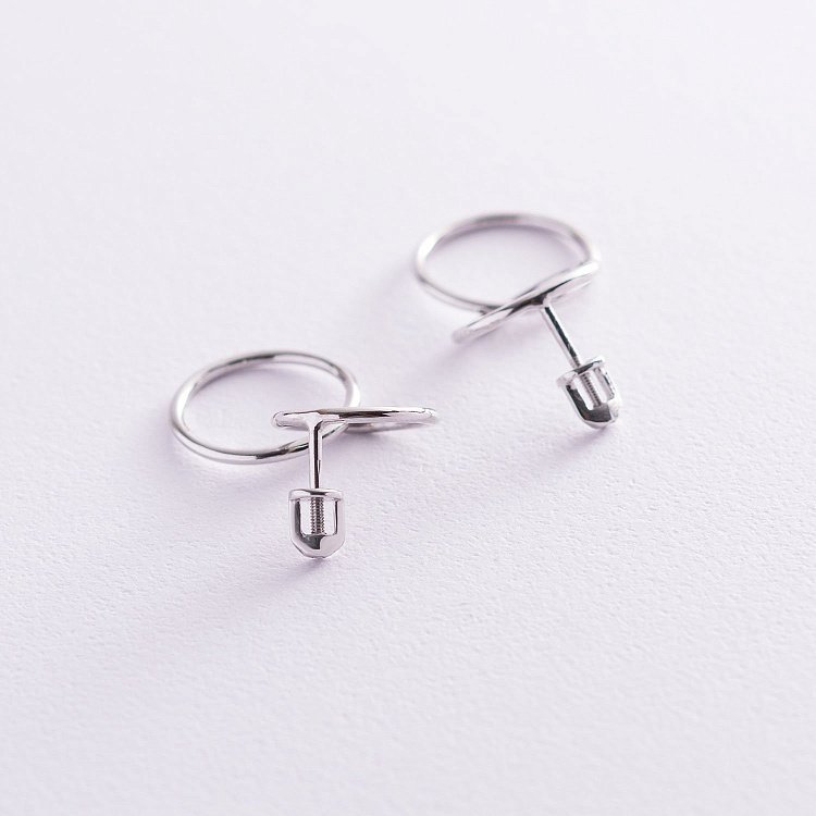 Серьги-пусеты "Кольца" в белом золоте с06980 от ювелирного магазина Оникс - 1