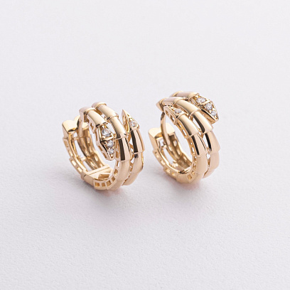 Серьги - кольца "Змеи" в желтом золоте (фианиты) с09378