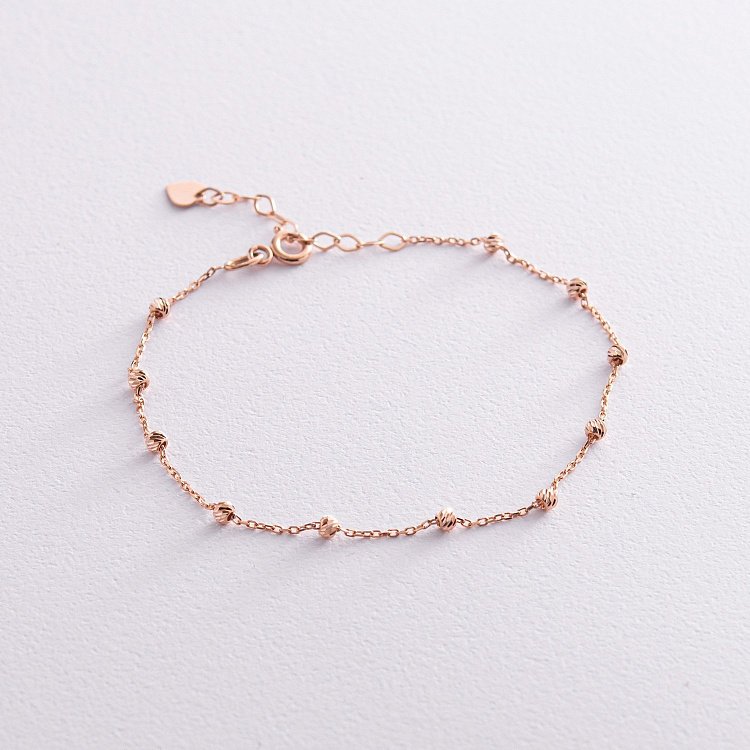 Браслет "Кульки" в червоному золоті б04568 від ювелірного магазину Онікс