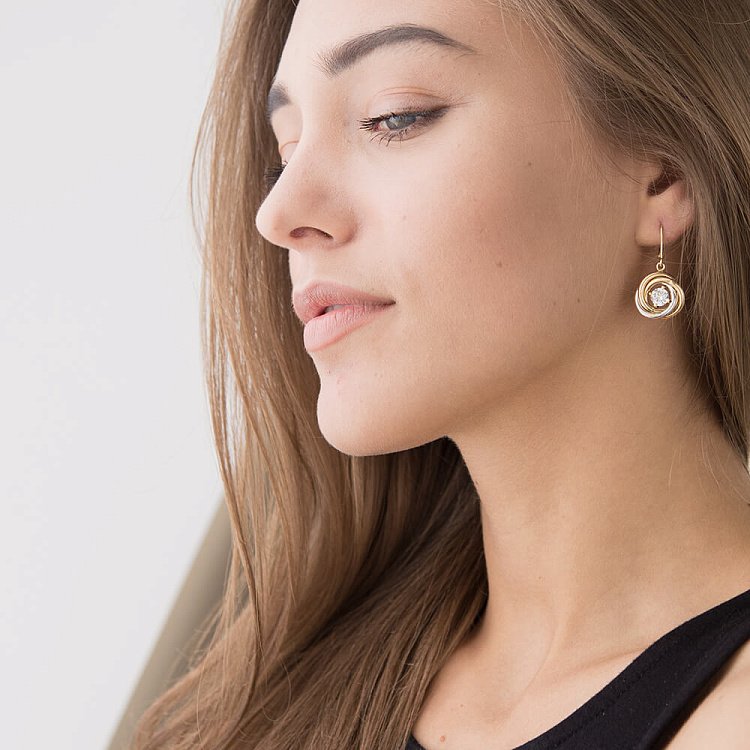 Золоті сережки з фіанітами с03830 від ювелірного магазину Онікс