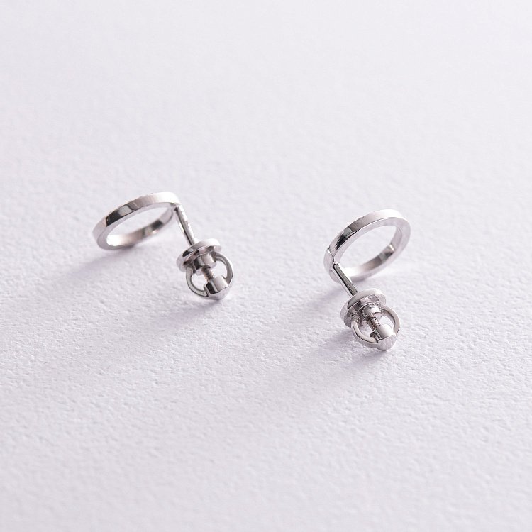 Золоті сережки - пусети "Кругообіг" з діамантами 323311121 від ювелірного магазину Онікс - 3