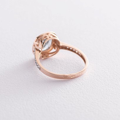 Золота каблучка з блакитним топазом і фіанітами к05439 №3