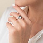Серебряное кольцо с голубым топазом и фианитами 111056 от ювелирного магазина Оникс - 1