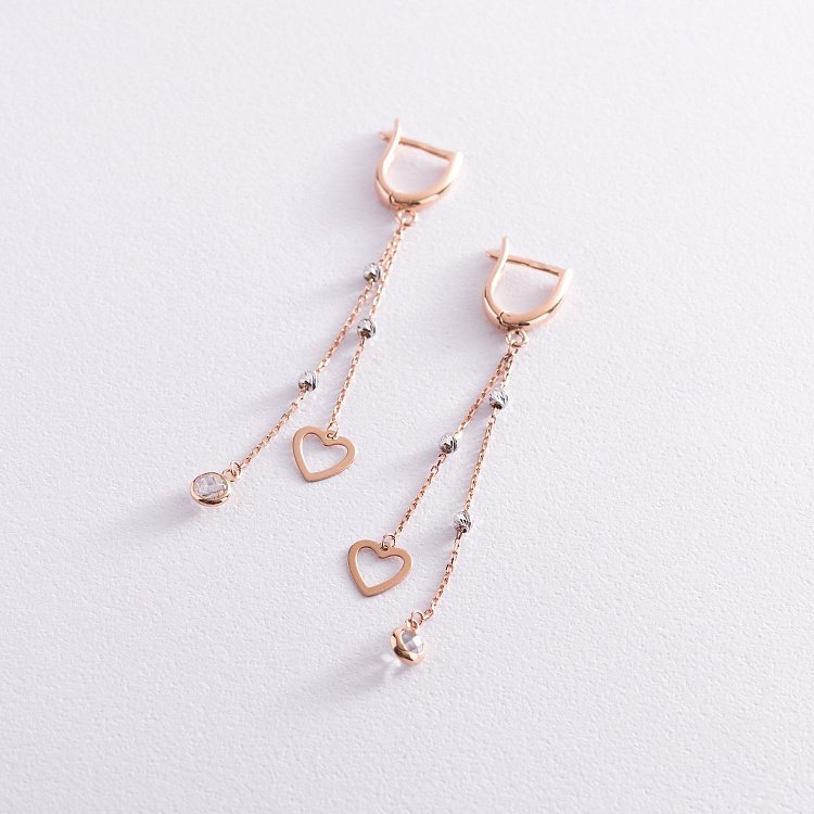 Золоті сережки "Сердечка" на ланцюжку (фіаніти) с07227 від ювелірного магазину Онікс