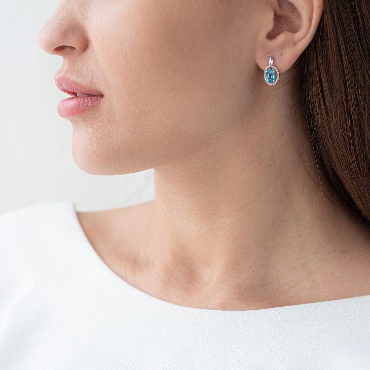 Золотые серьги с голубым топазом и бриллиантами C01083E от ювелирного магазина Оникс - 1