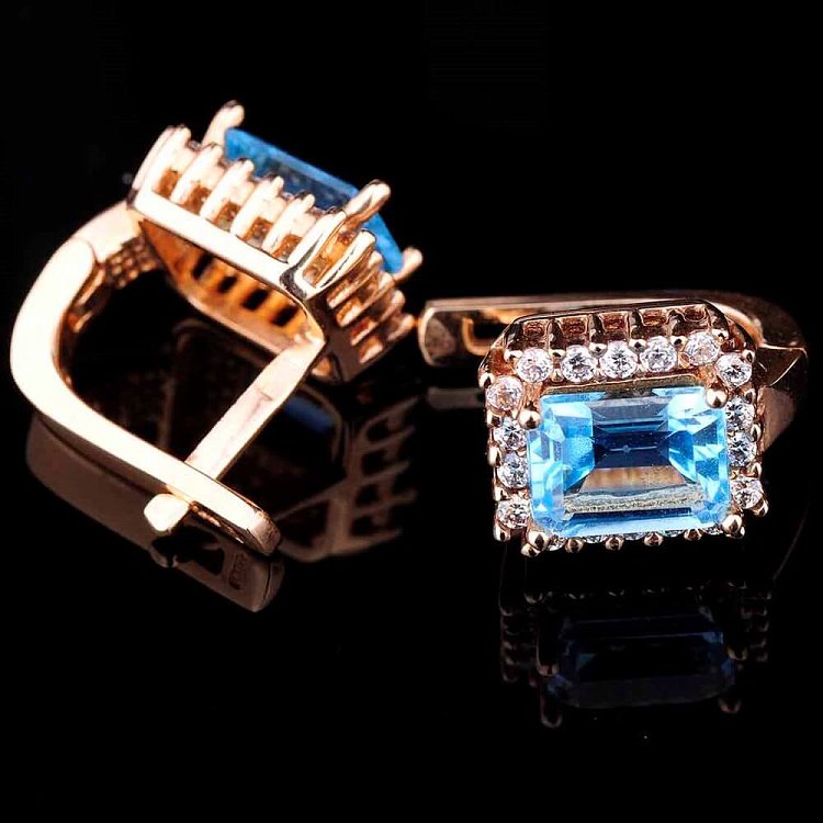 Золотые серьги с голубым топазом и фианитами с01685 от ювелирного магазина Оникс