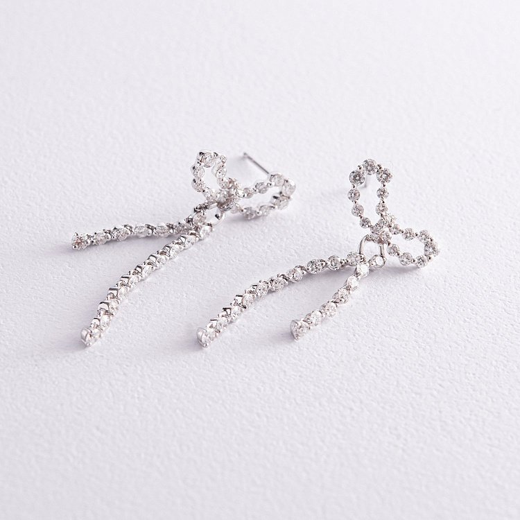 Золоті сережки - пусети "Бантики" з діамантами с542 від ювелірного магазину Онікс - 1