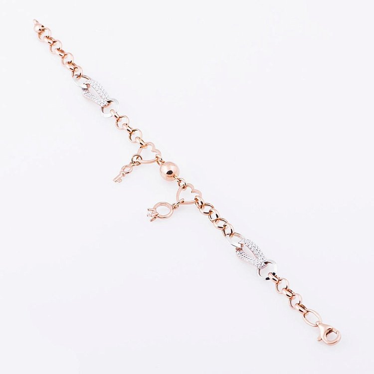 Женский золотой браслет с ключиком и колечком (фианиты) б02799 от ювелирного магазина Оникс - 1