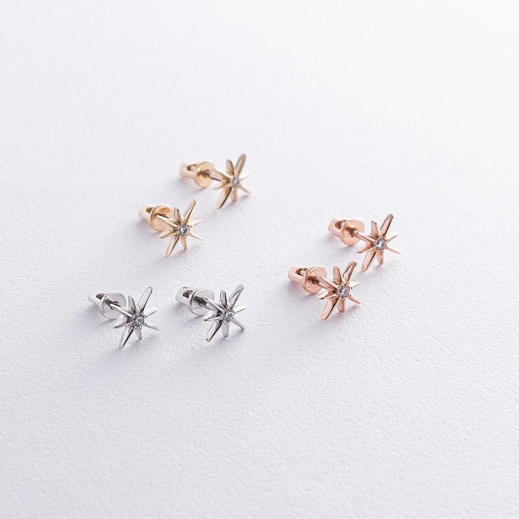 Золоті сережки - пусети "Зірки метеорити" з фіанітами с08596 від ювелірного магазину Онікс - 2