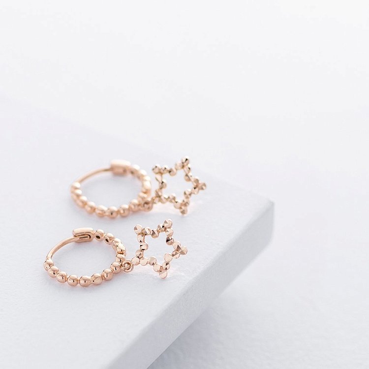 Золоті сережки "Зірочки" с06175 від ювелірного магазину Онікс