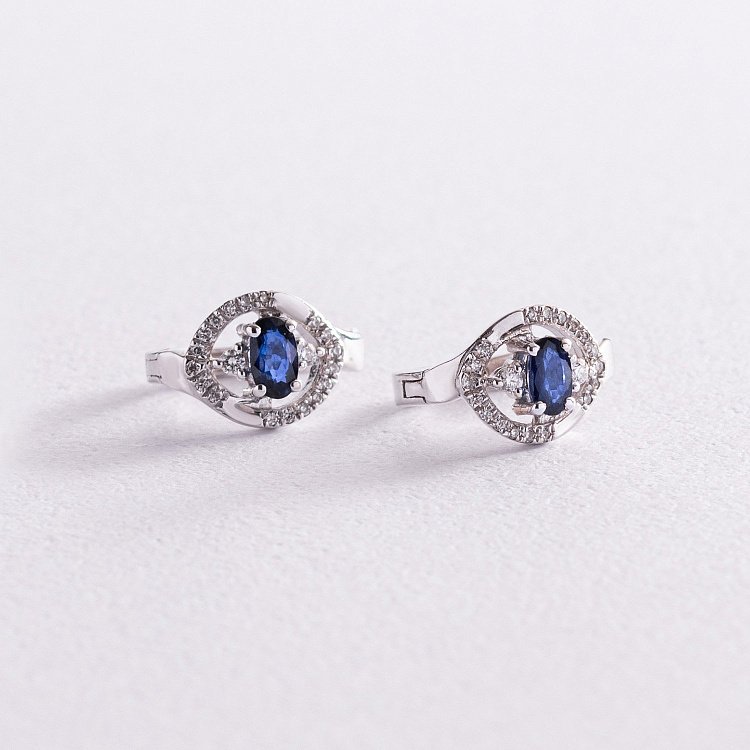 Золоті сережки з діамантами і сапфірами C01122E від ювелірного магазину Онікс