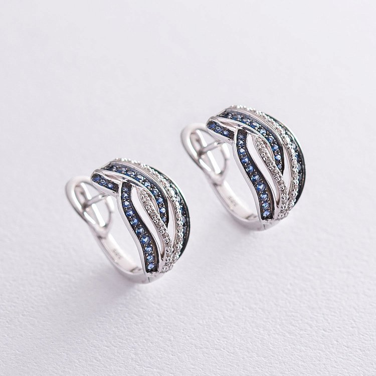 Золоті сережки з діамантами і сапфірами с605 від ювелірного магазину Онікс