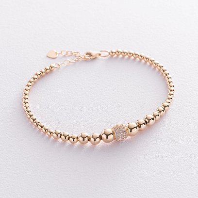 Браслет "Кульки" в жовтому золоті (фіаніти) б04652