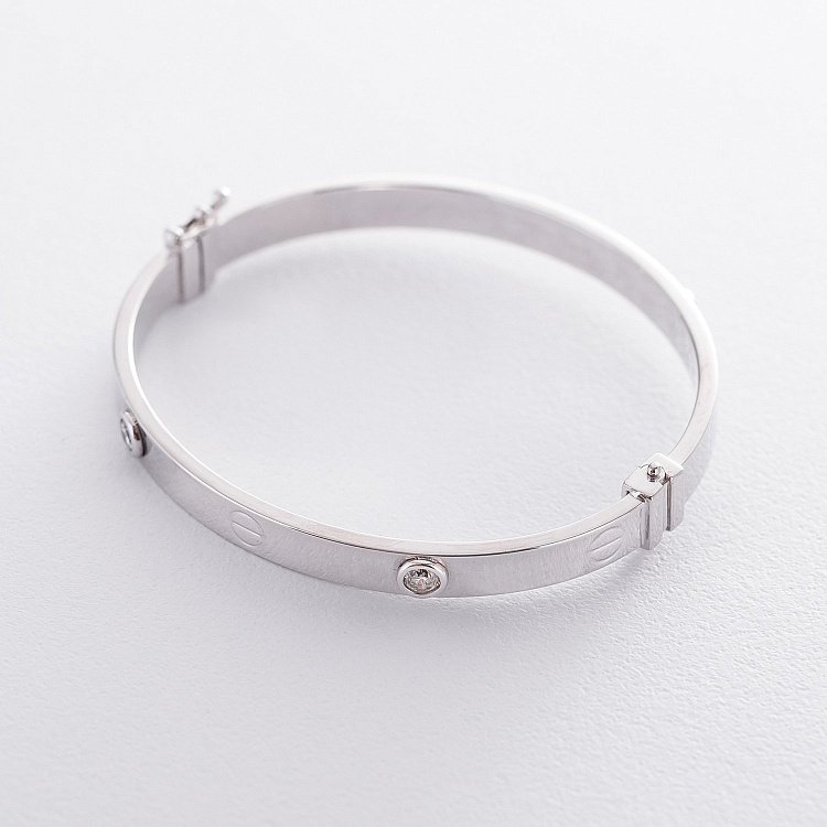 Жорсткий золотий браслет з фіанітами б04148 від ювелірного магазину Онікс