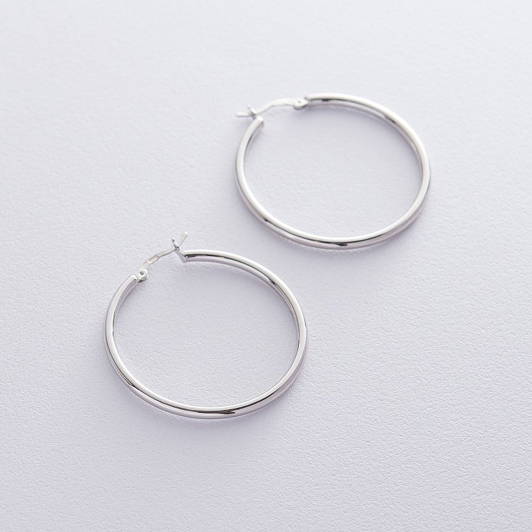 Срібні сережки-кільця 122566 від ювелірного магазину Онікс - 1