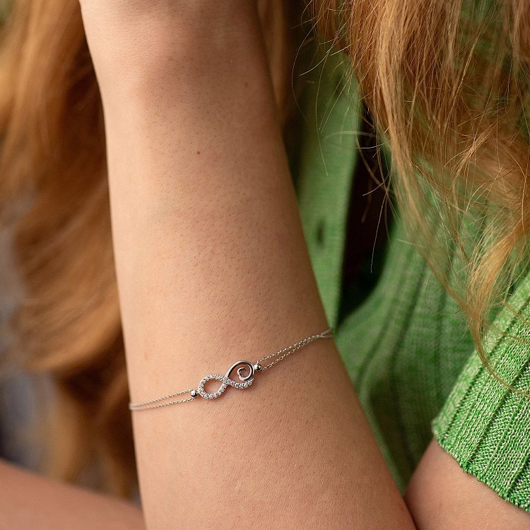 Браслет "Бесконечность" в белом золоте (фианиты) б05309 от ювелирного магазина Оникс - 1