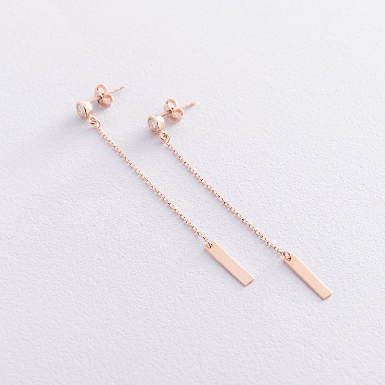 Золоті сережки - пусети на ланцюжку (фіаніти) с07249 від ювелірного магазину Онікс