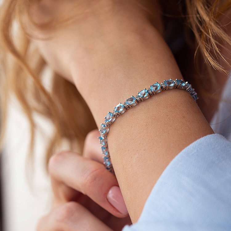 Золотий браслет з діамантами і топазами бр0348 від ювелірного магазину Онікс - 1