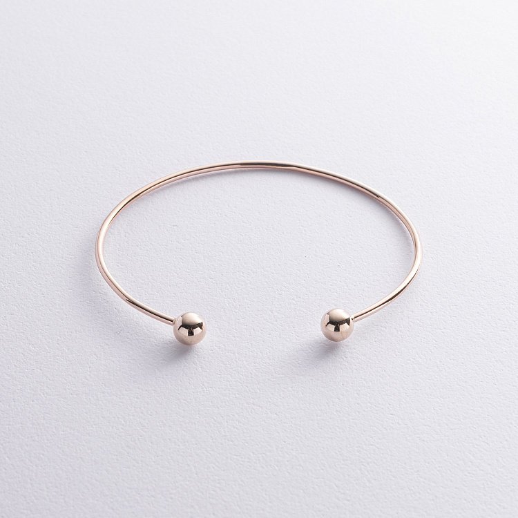 Жорсткий браслет "Кульки" (жовте золото) б05475 від ювелірного магазину Онікс