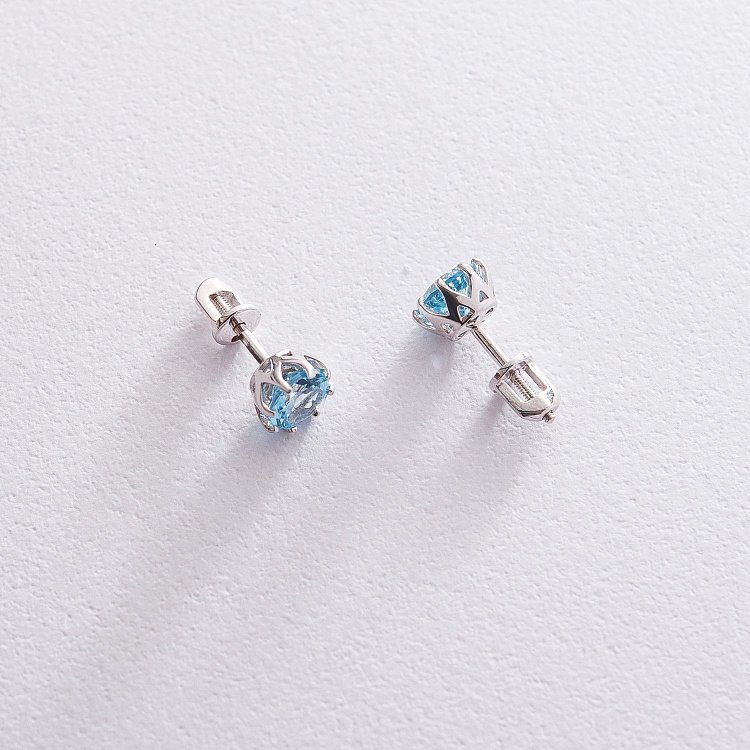 Золотые серьги - пусеты (топаз голубой) с06675 от ювелирного магазина Оникс - 5