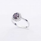 Серебряное кольцо с альмандином и фианитами 111149 от ювелирного магазина Оникс