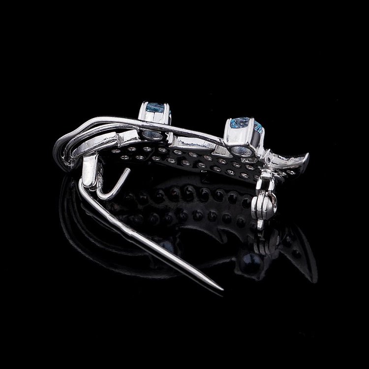 Срібна брошка (фіаніти, блакитний топаз) 16085 від ювелірного магазину Онікс - 1