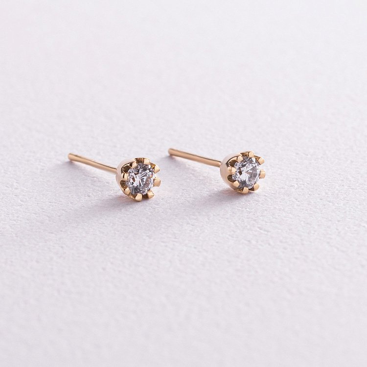 Золоті сережки - пусети з фіанітами с05845 від ювелірного магазину Онікс