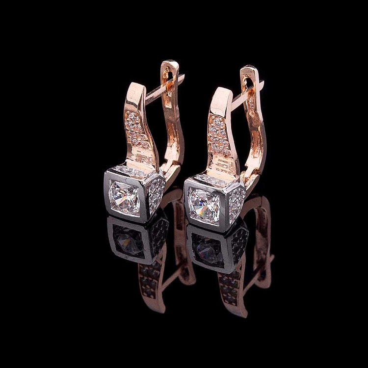 Золоті сережки з фіанітами с04124 від ювелірного магазину Онікс