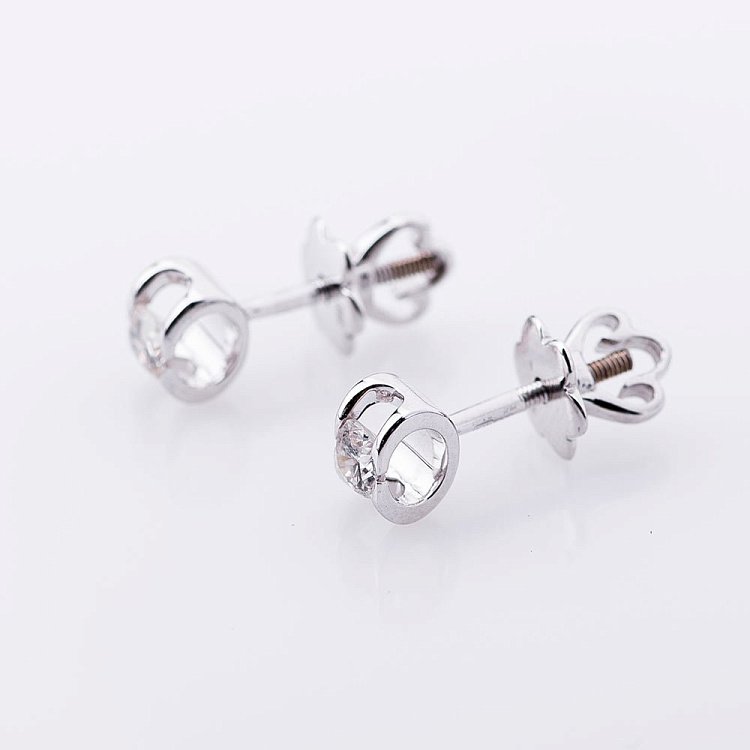 Золоті сережки-пусети з діамантами е0598б від ювелірного магазину Онікс - 1