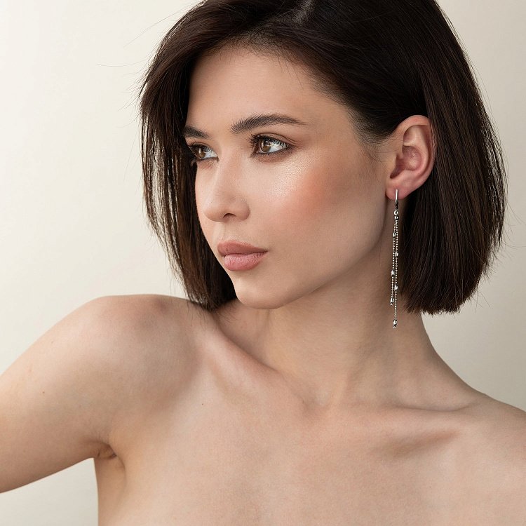 Срібні висячі сережки з кульками 123074 від ювелірного магазину Онікс - 1