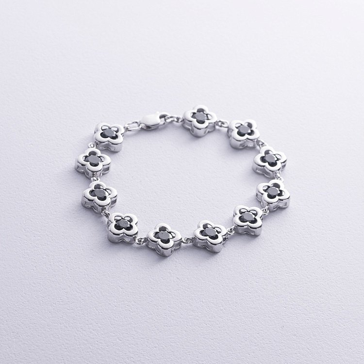 Срібний браслет "Конюшина" (чорні фіаніти) 141481 від ювелірного магазину Онікс