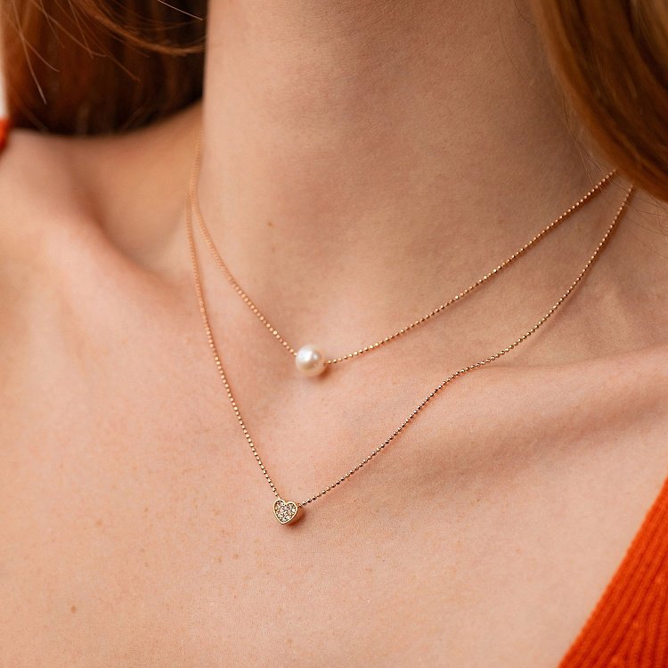 Подвійне кольє "Сердечко і перлина" з фіанітами (червоне золото) кол02546 від ювелірного магазину Онікс