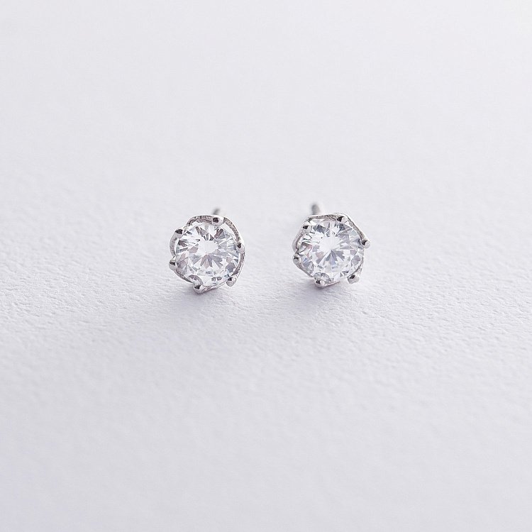 Золотые серьги-гвоздики с фианитом с04760 от ювелирного магазина Оникс