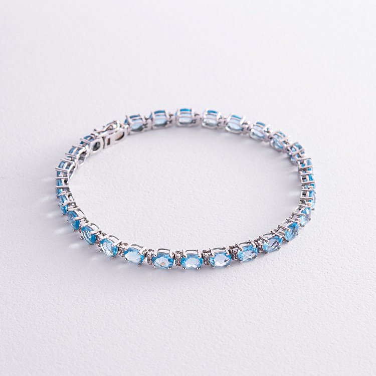 Золотой браслет с бриллиантами и топазами бр0348 от ювелирного магазина Оникс