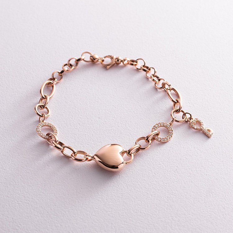 Браслет у червоному золоті "Серце і ключ" (фіаніти) б04934 від ювелірного магазину Онікс