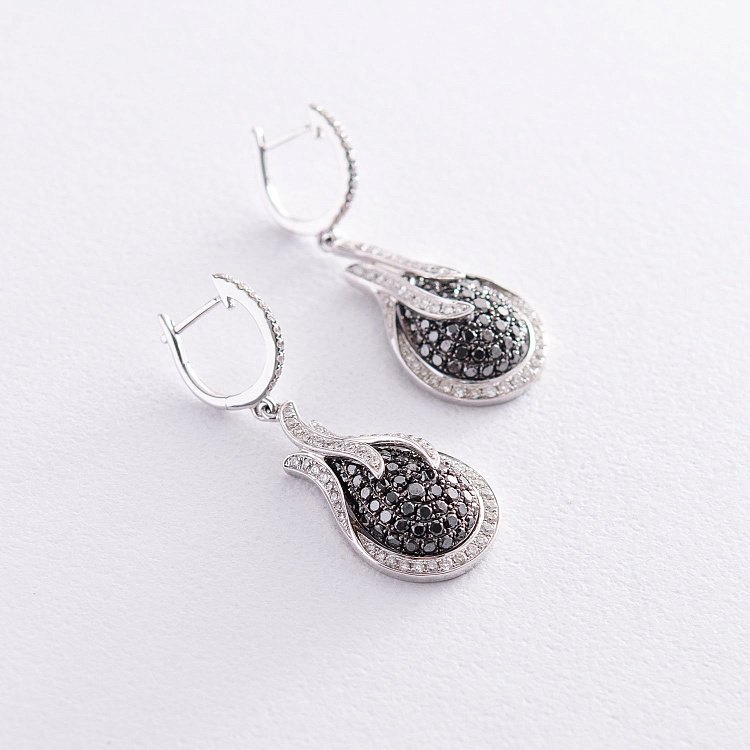 Золоті сережки з білими і чорними діамантами с784 від ювелірного магазину Онікс