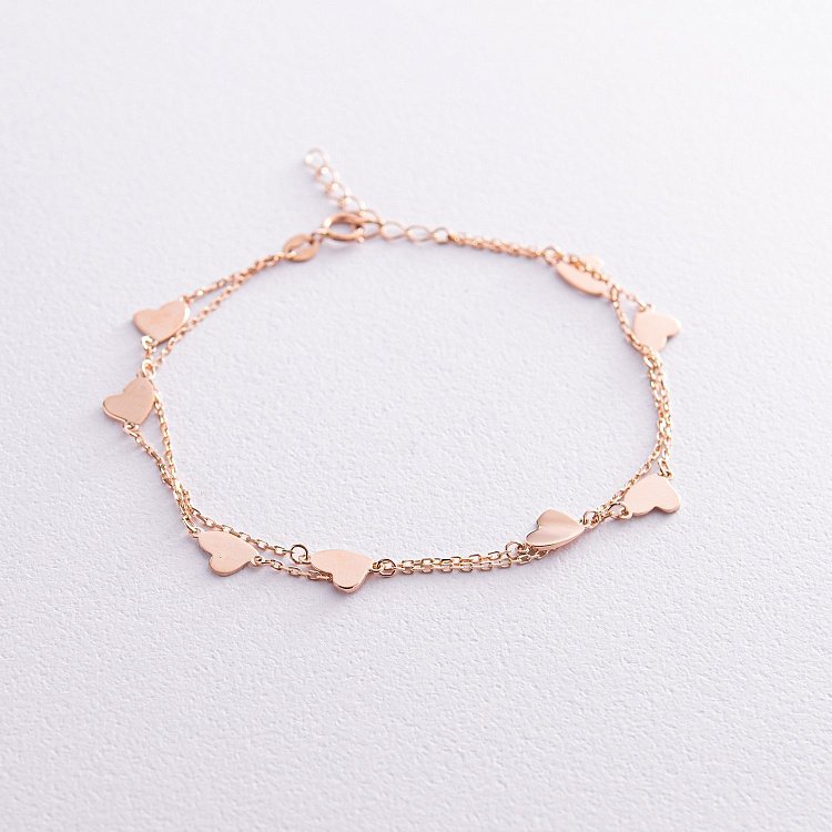 Двойной золотой браслет "Сердечки" б05114 от ювелирного магазина Оникс