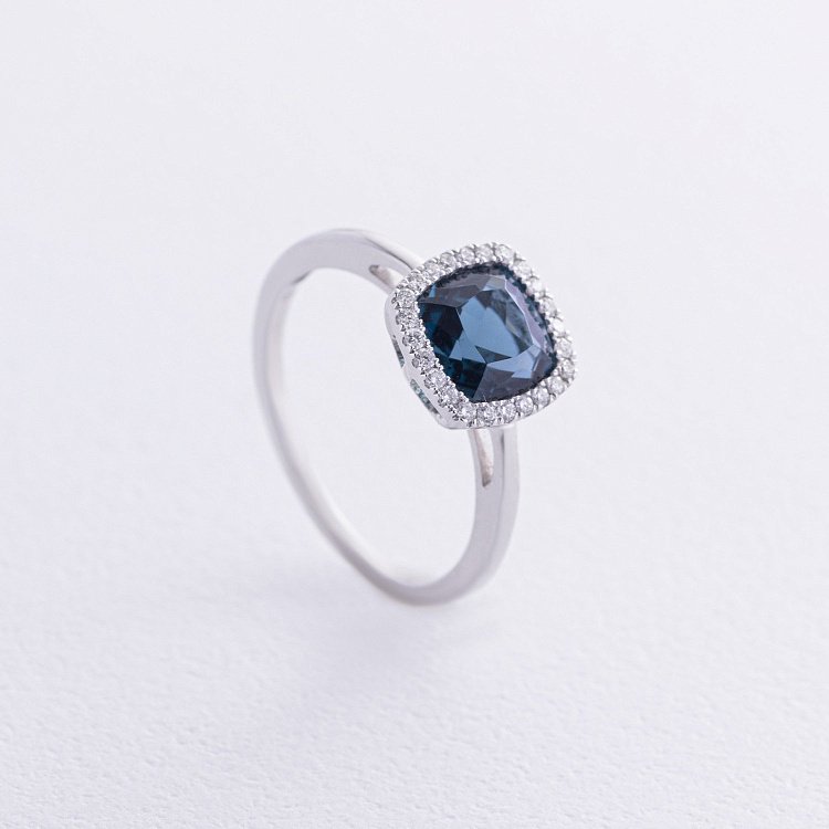 Золота каблучка (топаз "Лондон Блю", діаманти) кб0528sm від ювелірного магазину Онікс