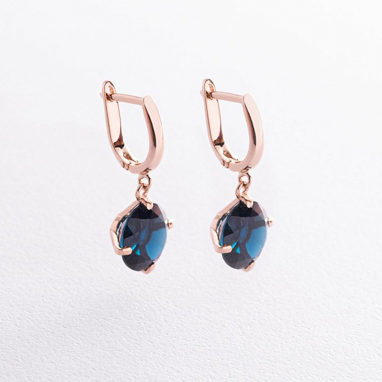 Золотые серьги "Влечение" с синт. топазом с08573 от ювелирного магазина Оникс