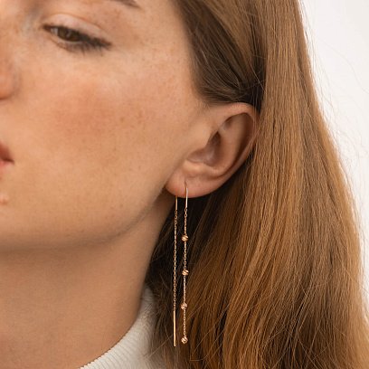 Сережки - протяжки з кульками (червоне золото) с09047