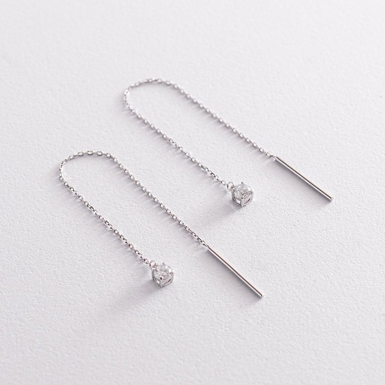 Золотые серьги - протяжки с фианитами с07704 от ювелирного магазина Оникс