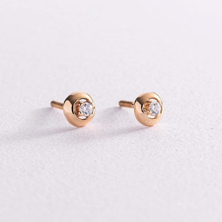 Золоті сережки-пусети з фіанітами с04946 від ювелірного магазину Онікс