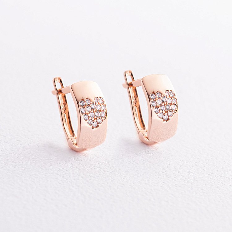 Золоті сережки "Сердечка з фіанітами" с05411 від ювелірного магазину Онікс